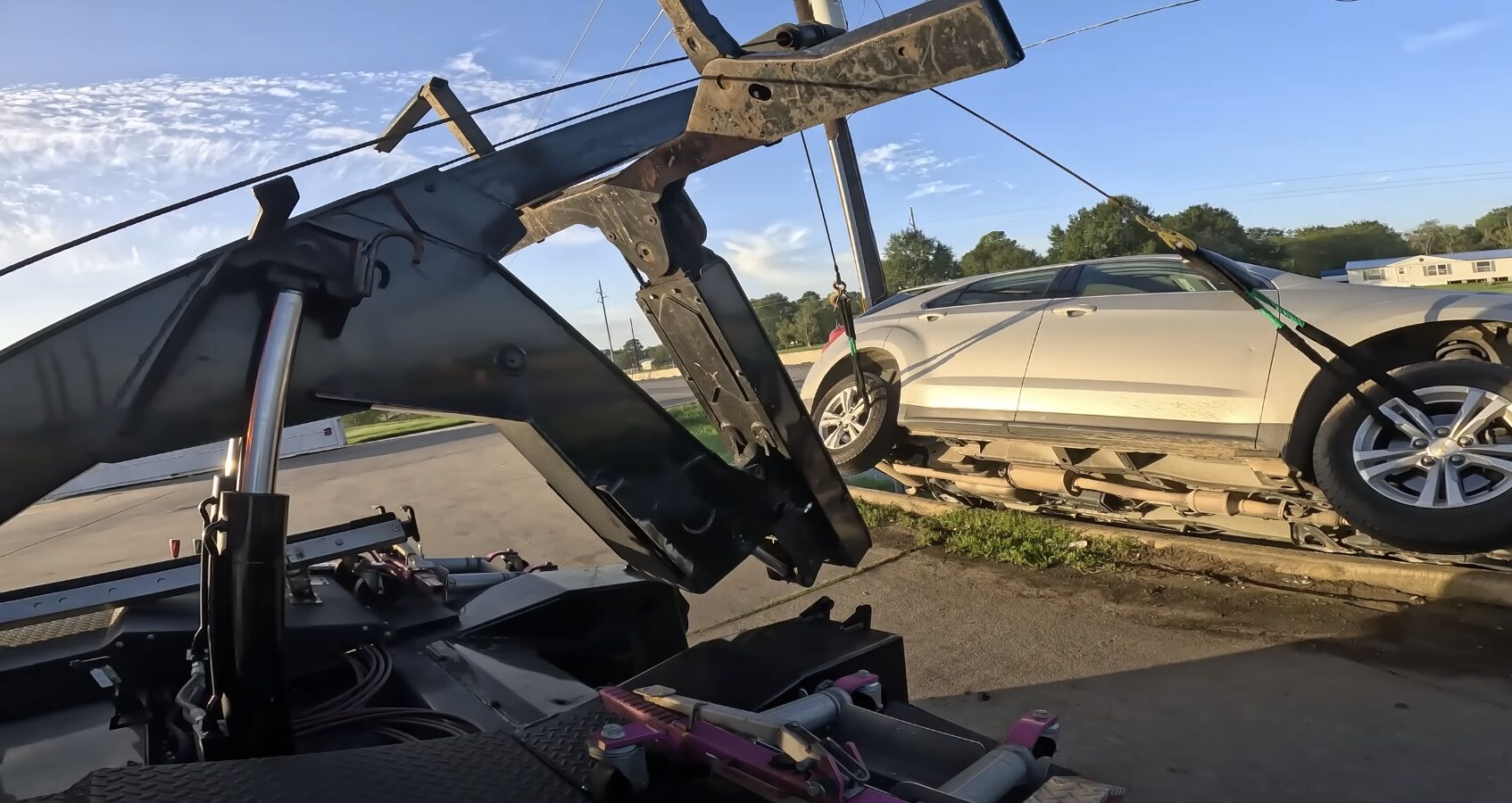 Roadside assistance technician helping with vehicle breakdown and towing